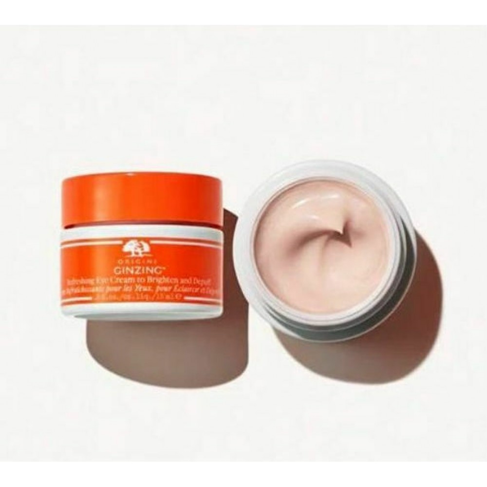 Origins Ginzing Moisturizing Eye Cream with Light Color against Dark